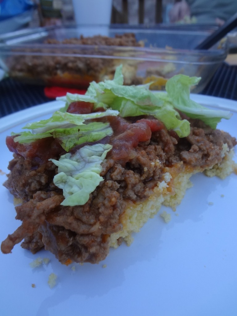 This Taco Cornbread Pizza is a recipe you can throw together in a pinch. Stop by for the super simple recipe!
