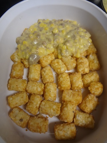 tator tots topped with ground turkey mixture