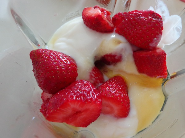 strawberries, yogurt and honey in mixer