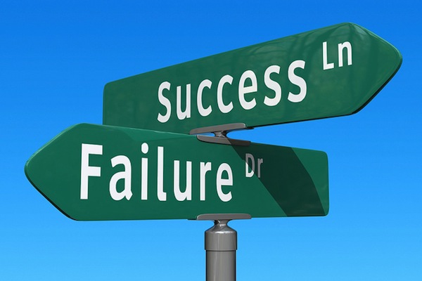 success lane and failure drive street signs