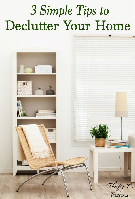 minimalist sitting area with chair and bookshelf