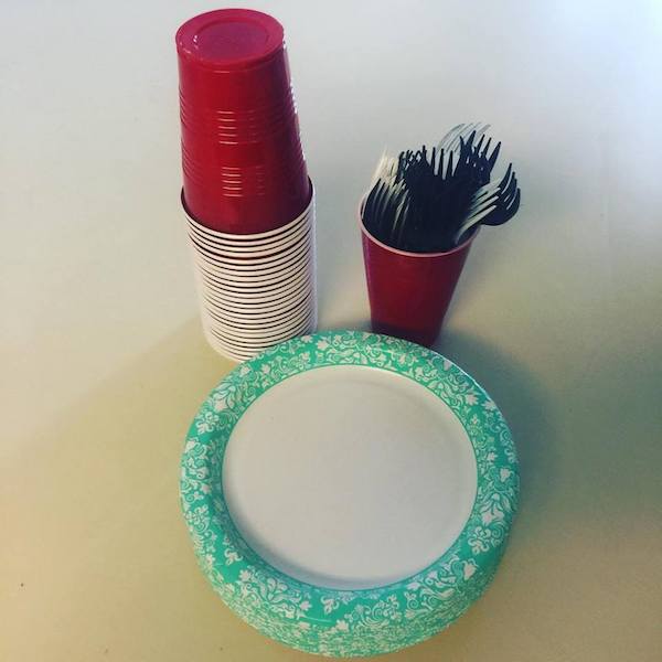 paper plates and plastic cups and forks