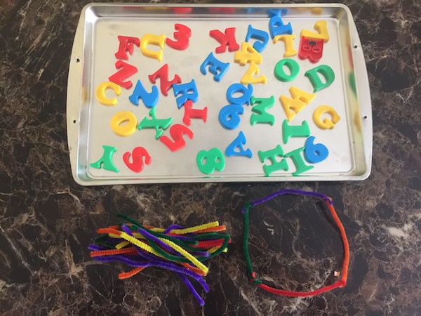 cookie sheet with magnetic letters, and wiki sticks