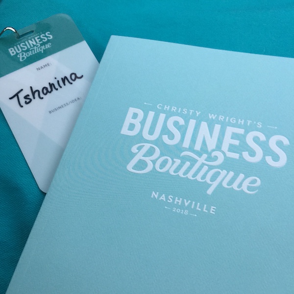 book and nametag from business boutique in nashville, tn