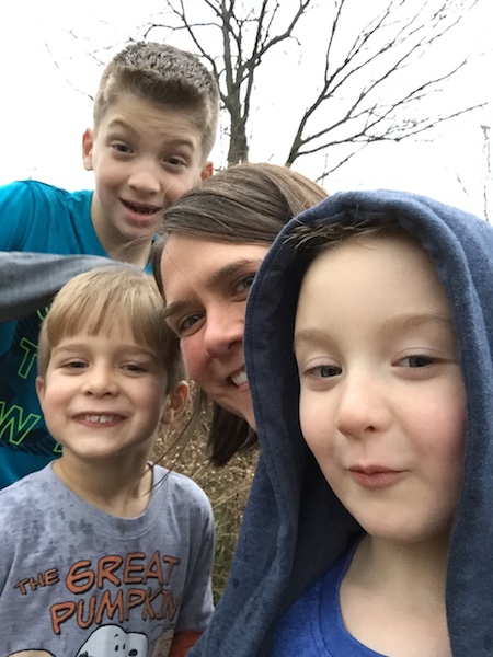 woman and little boys outdoors