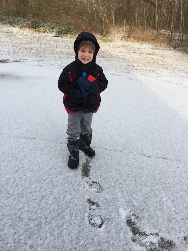 little boy in the snow